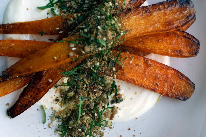 Smoked Carrots Cooked In Whey with Labneh and Carrot Top Dukkah