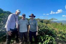 Load image into Gallery viewer, Ozone Head Roaster Gary Whiteley, Pedro Flores, and Ozone Green Buyer Roland Glew on Pedro's farm Villa Rosario, in Caranavi, Bolivia