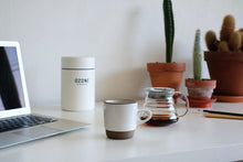 Load image into Gallery viewer, Miir coffee canister, mug and freshly brewed coffee
