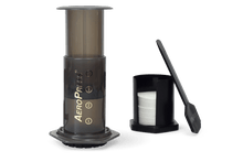 Load image into Gallery viewer, Aeropress brewer with filter papers