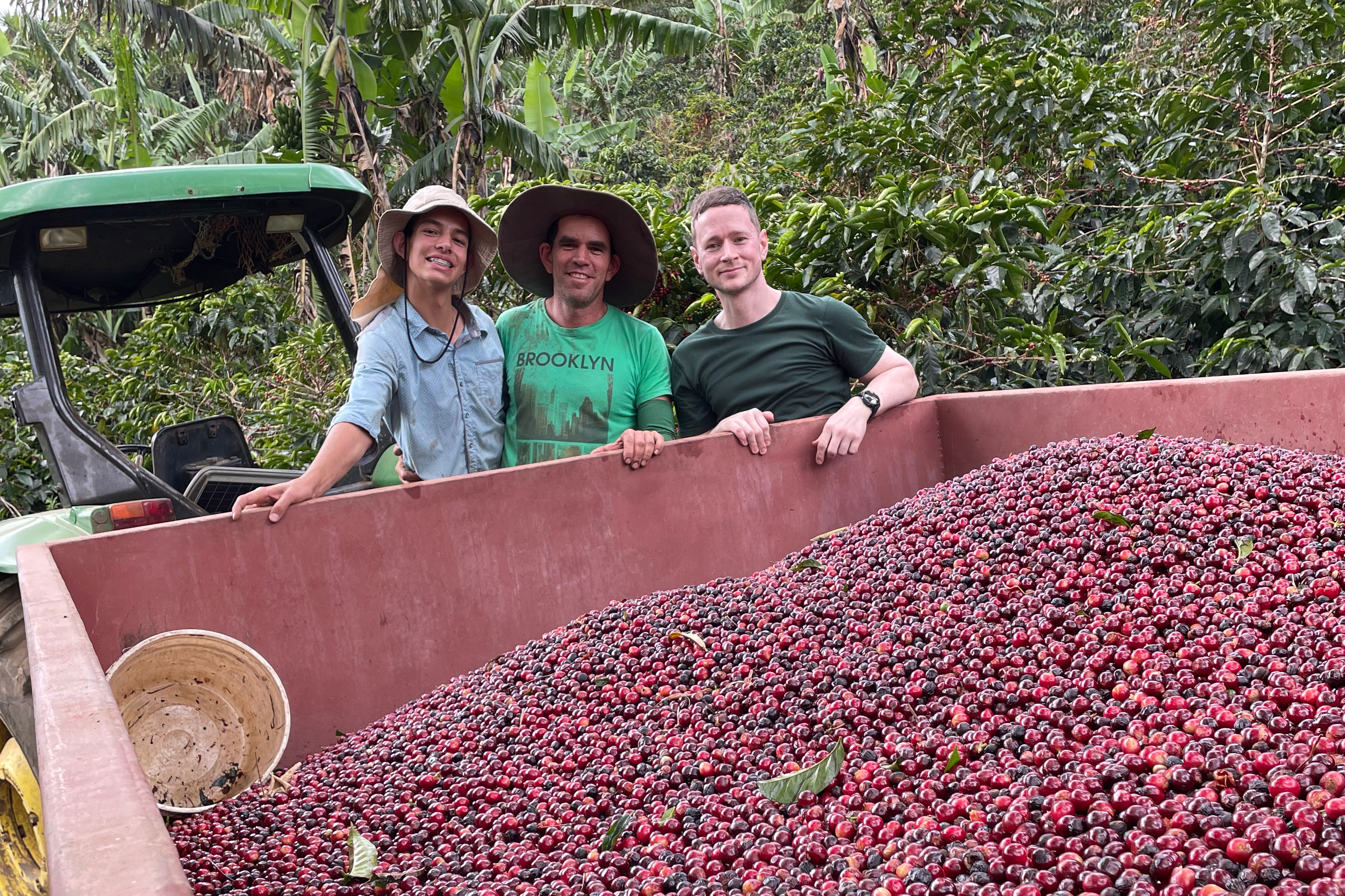 Nacho Oviedo, Allan Oviedo, and Ozone Head of eCommerce Chris Glover-Price with a truckload of freshly harvested coffee cherries from Finca Carmela in Costa Rica.