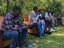 Load image into Gallery viewer, Members of the Tokuma Farmers Group of Jimma, Ethiopia, attending a group meeting to discuss issues facing their annual production.

