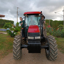 Load image into Gallery viewer, Chris Glover-Price, Jose Ignacio Arrieta and OCR Green Buyer Roland Glew after a tractor ride together ending at the ARBAR micromill
