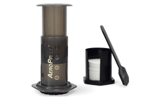Load image into Gallery viewer, Aeropress brewer with filter papers
